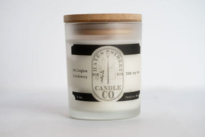 Candle with a label on a white background