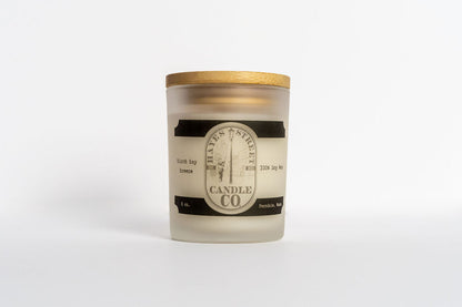 Candle with a label on a white background. Hayes Street Candle Company logo, with Birch Bay Breeze scent. It is 100% soy wax, 5 oz, and made in Ferndale Wash